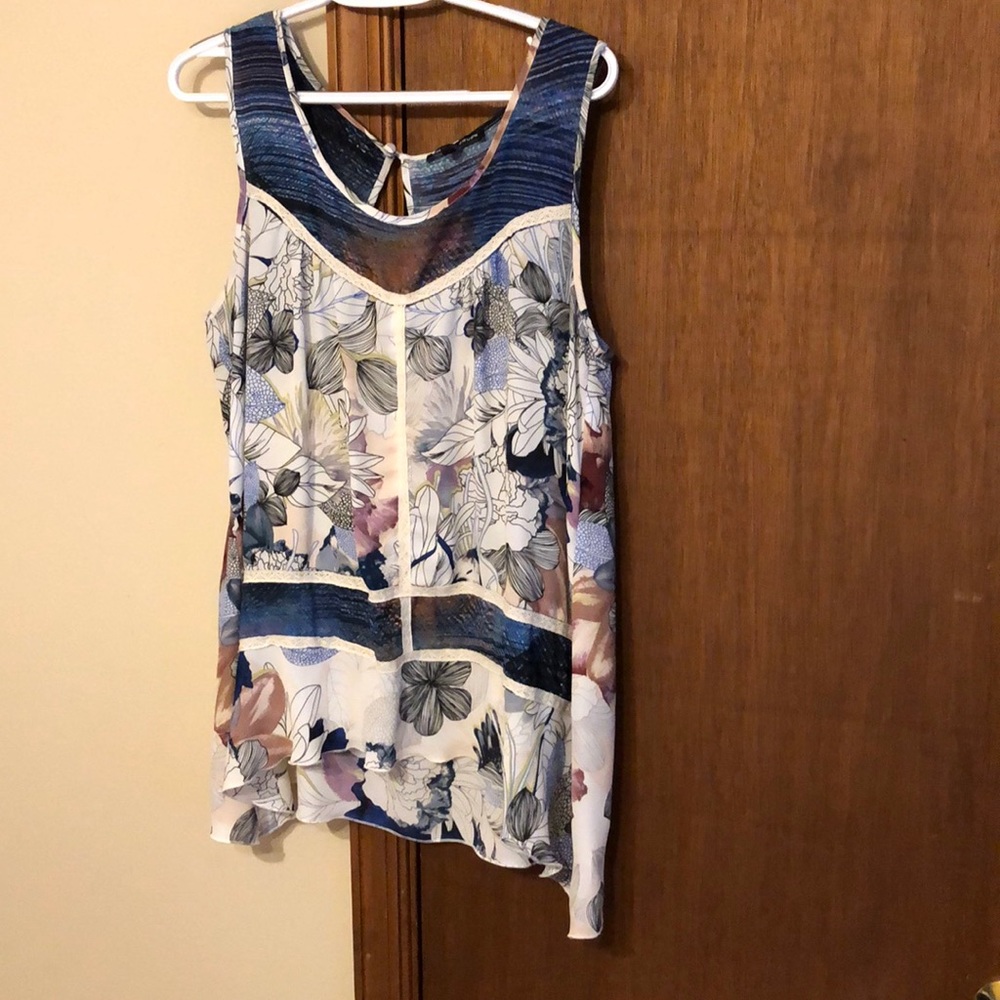 Cable and gauge sleeveless blouse